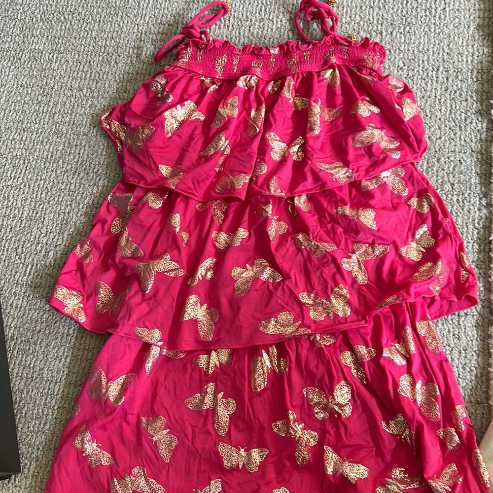 Very cute pink with butterflies print juicy couture swim cover up.